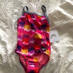 Girls size 8 Uglies brand one piece colorful NWT, hygiene liner in place.